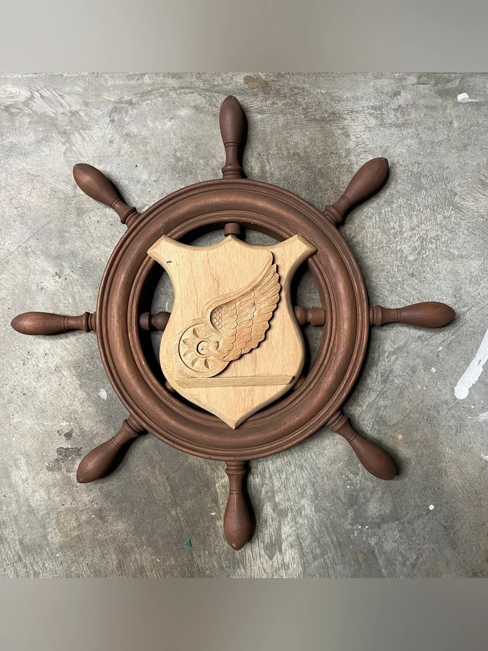 Wooden Ship Wheel Wall Decor with Carved Shield Accent (Dark)
